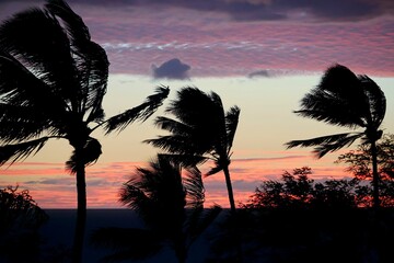 The sun sets on Kihei on the island of Maui