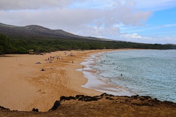 Beachgoers enjoy a day at Makena Beach in Maui