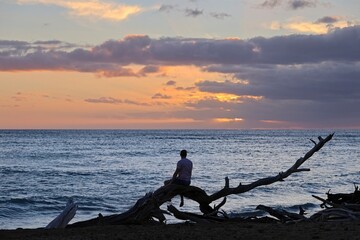 The sun sets on the Hawaiian island of Maui
