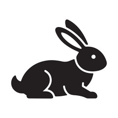Fototapeta premium A simple black silhouette of a cute rabbit sitting with long ears and a round body isolated on transparent background
