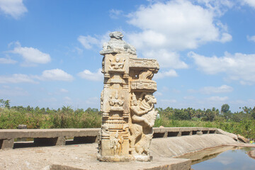 Fototapeta premium India, Karnataka, Mysuru, Beautifully Carved Pillar of Hindu Temple in Bank of Kaveri River. Carvings of Hindu Deities.