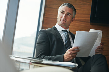 Documents, thinking and research with business man in office for investment broker, account advisor and vision. Risk analyst, trading reflection and paperwork with mature person in agency for idea