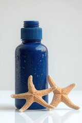 blue bottle with water droplets and two beige starfish on a glossy surface, evoking calm beach serenity