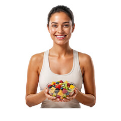 Healthy athletic woman holding a bowl of colorful fresh fruit salad, smiling contentedly on an isolated transparent background.