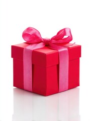 Obraz premium A Bright Red Gift Box Tied With A Pink Glitter Ribbon Bow On A White Background