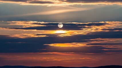Ethereal moonrise over majestic hills under a dramatic sunset cloudscape painting the horizon