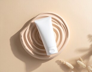Minimalist beauty cream tube on textured beige podium, bathed in sunlight with soft shadows and delicate pampas grass accents for skincare product display