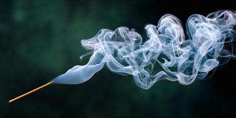 Incense stick burning creating swirling smoke wisps
