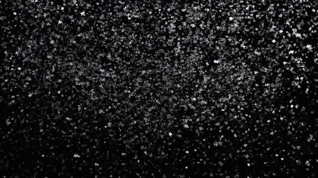 Abstract background of randomly distributed tiny specks with soft reflections and a minimalist aesthetic