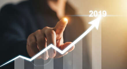 Graph Trend Line Pointing 2019 Growth. Businessman Touching with Finger Financial Chart Growth Business Development Strategy Concept