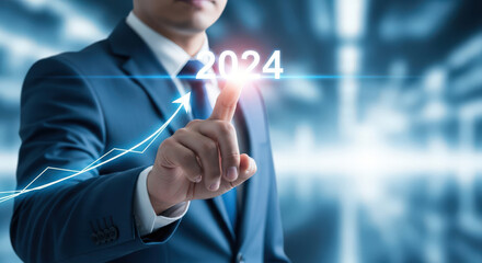 Future Business Trends Vision Concept with Businessman Touching Year 2024 on Virtual Screen with Arrow, Representing Growth and Strategy