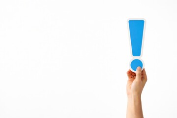 Hand Holding Blue Exclamation Mark on White Background