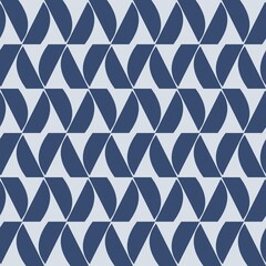 Seamless blue geometric triangle pattern with a repeating abstract design for wallpaper, fabric, or background use