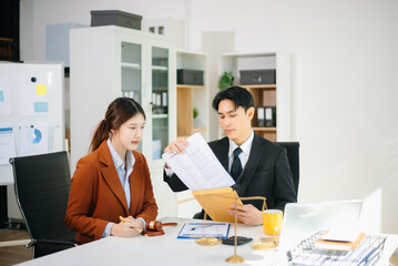 Professional team lawyers consulting on legal cases in a modern office. Perfect for law, business, justice