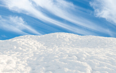 Bright snowy hills under blue sky landscape. 3D rendering.