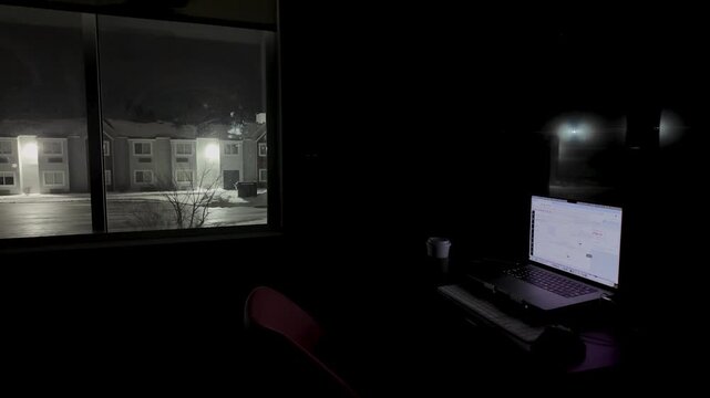 Dark Room Night Remote Work with Laptop and Window Light