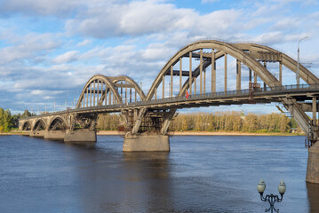View of the automobile bridge over the Volga river on a sunny September day, Rybinsk