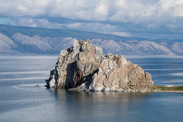 View of Shamanka rock on Baikal lake on a September day. Irkutsk region, Russia