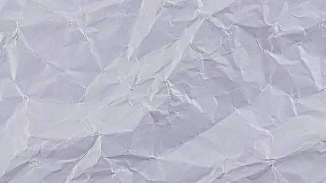 White crumpled paper stop motion background texture.White moving paper texture.Animated white clean empty crumpled paper background,Crumpled white paper texture pattern stop motion animation backgroun