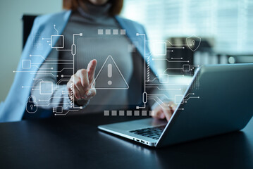 Cybersecurity warning concept with digital alert interface, highlighting data risk, privacy threats, secure systems, compliance
