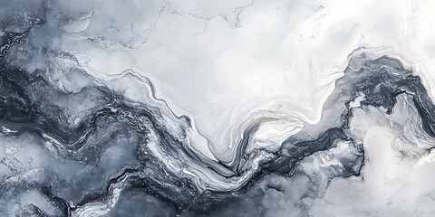 Abstract fluid art with swirling gray and white patterns creating a marble like effect on canvas