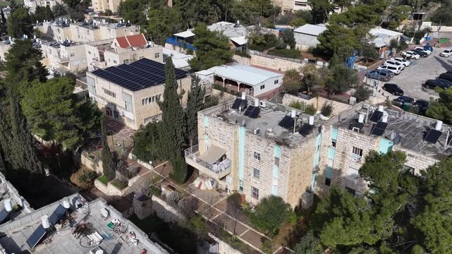Aerial Kiryat Arba Neighborhood Israel

Drone footage of residential blocks, streets, and green areas in Kiryat Arba, November 2025, Israel
