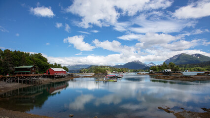 Dramatic sky and clouds reflecting water in Halibut Cove Alaska United Statesd