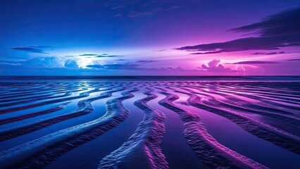 Serene ocean shoreline during twilight with colorful sky and rippled sands