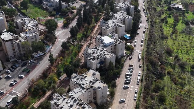 Aerial Kiryat Arba Neighborhood Israel

Drone footage of residential blocks, streets, and green areas in Kiryat Arba, November 2025, Israel

