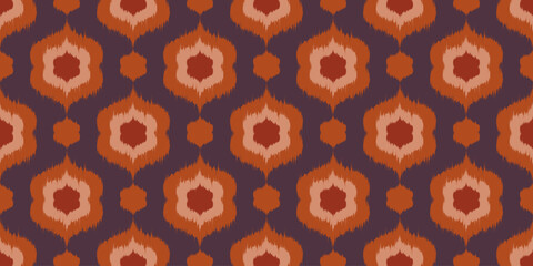 Ikat seamless pattern with floral motif. Abstract ethnic vector print with rug texture. Vintage decorative ornament retro background. Batik art traditional wallpaper. © Chorna_L