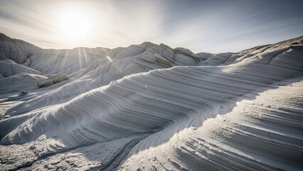 Serene snow-covered mountain landscape with dynamic cloud formations and soft sunlight casting