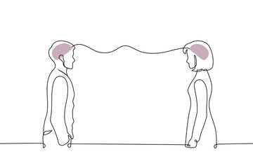 man and a woman standing opposite each other with a wavy line connecting their brains. telepathic communication, mental connection, and psychological understanding between people on white