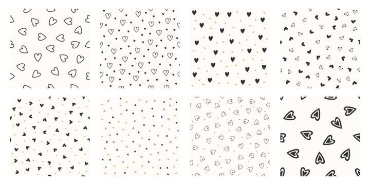 Set of various hand drawn seamless patterns with hearts of different styles