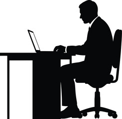 Silhouette of a focused businessman wearing a suit sitting in an office chair while intently typing on a modern laptop computer at a desk