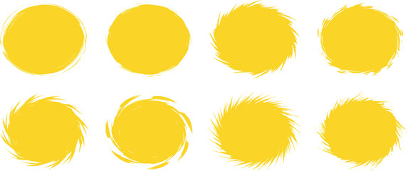 A collection of yellow circles and brush strokes on a white background viewed from a straightforward perspective.