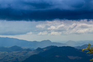 Summer scenery in the Transylvanian Alps with spectacular imagery and dramatic storm clouds, in July and August