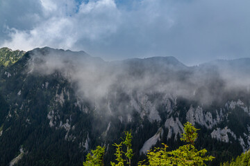 Summer scenery in the Transylvanian Alps with spectacular imagery and dramatic storm clouds, in July and August