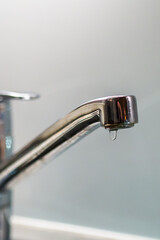 Leaking faucet with single water drop