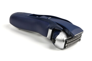 Electric razor. A battery-powered razor on a white background.
