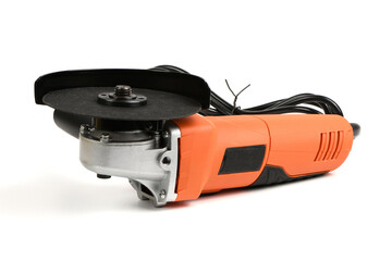 Powerful angle grinder with abrasive disk isolated on a white background.