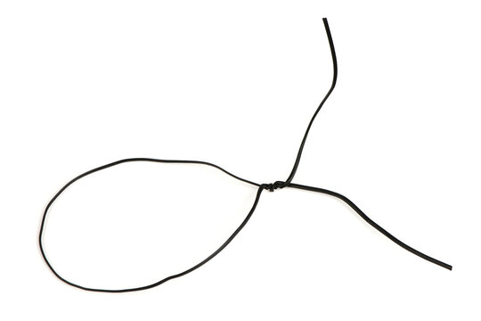 Black insulated wire loop with knot isolated on white