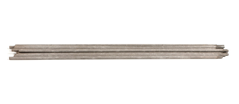 Stack of manual arc welding electrodes isolated on white