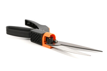 Black and orange garden grass shears isolated on white background