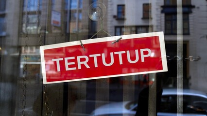 closed sign in Malay