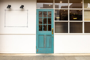 sidewalk by street wall  and  door