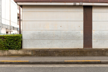 street wall background ,Industrial background, empty grunge urban street with warehouse brick wall