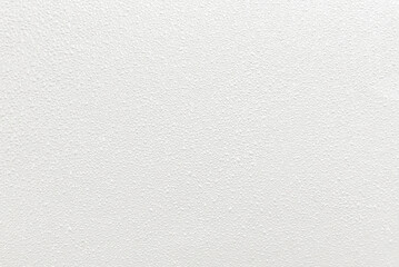 water drops on uniform paper background