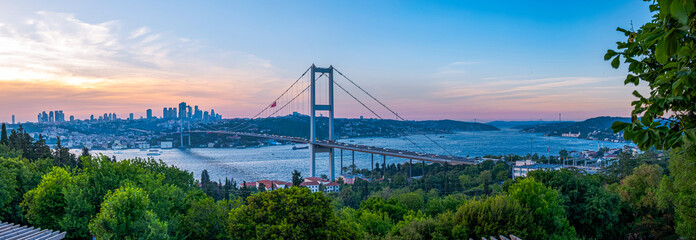 Istanbul Bosphorus panoramic photo. Istanbul landscape beautiful sunset with clouds Ortakoy Mosque, Bosphorus Bridge, Fatih Sultan Mehmet Bridge Istanbul Turkey.Best touristic destination of Istanbul © Ahmetpekts