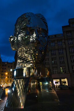 Head of Franz Kafka, also known as the Statue of Kafka, is an outdoor kinetic sculpture by David Cerny in Prague at night, Czech Republic