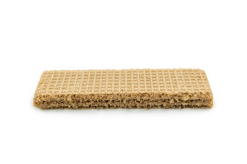 Single rectangular crispy wafer biscuit with chocolate cream filling isolated on white background. Close-up side view of a crunchy sweet snack.